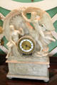 Mantel clock with young woman as day & old man pulling curtain of night at Chepstow. Newport, RI.