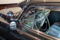 External spotlight & steering wheel of Hudson Commodore Sedan at Audrain Automobile Museum. Newport, RI.