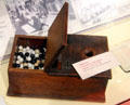 Ballot box of Carpenters & Joiners Union uses black & white balls for votes at Museum of Work & Culture. Woonsocket, RI