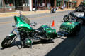 Green painted Yamaha motorcycle with matching trailer. Lead, SD.