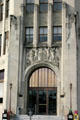San Antonio Express News Building entrance with carvings by Pompeo Coppini. San Antonio, TX.