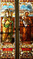 Stained glass windows in former church of Ursuline Academy showing saints. San Antonio, TX.