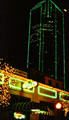 Bank of America Plaza at night with green lights. Dallas, TX.