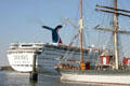 Cruise ship Ecstacy passes museum ship Elissa. Galveston, TX.