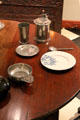 Early American table object including silver tankard, beaker & porringer in Murphy room at Bayou Bend. Houston, TX.