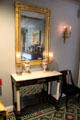 Mirror & New York side table in Chillman Foyer at Bayou Bend. Houston, TX.