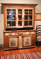 Rustic Germanic stenciled cupboard from Berks County, PA in Folk Art room at Bayou Bend. Houston, TX.