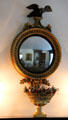 Concave mirror with eagle at Nichols-Rice-Cherry House at Sam Houston Park. Houston, TX.