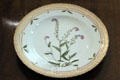 Porcelain Royal Copenhagen 'Flora Danica' plate painted with flowering plant at Rienzi house museum. Houston, TX.