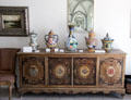 Czech sideboard with antique pottery at Czech Cultural Center. Houston, TX.