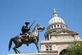 Terry's Texas Rangers monument by Pompeo Coppini with State Capitol. Austin, TX.