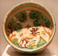 Earthenware bowl painted with jumping canine from Spain at San Antonio Museum of Art. San Antonio, TX.