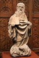 St. Anthony Abbot & hog symbol limestone sculpture from Burgundy, France at McNay Art Museum. San Antonio, TX.