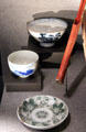 Ceramics & chop sticks found in Nagasaki after WWII at National Museum of the Pacific War. Fredericksburg, TX.