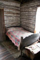 Bed & cradle in Walton-Smith log cabin at Pioneer Museum. Fredericksburg, TX.