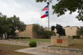 Museum of Western Art building with Out of the Mystic Past sculpture by Fritz White. Kerrville, TX.