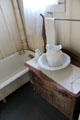 Bathtub with pitcher & basin at LBJ Boyhood Home. Johnson City, TX.