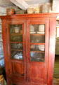Screened cabinet with creamery equipment at Sauer-Beckmann Farmstead. Stonewall, TX.