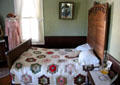 Bedroom with quilt at Sauer-Beckmann Farmstead. Stonewall, TX.