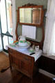 Mirrored washstand with basin & pitcher at Sauer-Beckmann Farmstead. Stonewall, TX.