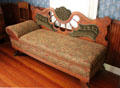 Daybed sofa with carved back at Sauer-Beckmann Farmstead. Stonewall, TX.