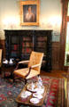 Chair & side table in library at McFaddin-Ward House. Beaumont, TX.