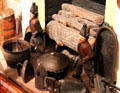 Fireplace with Hessian andirons & iron cooking pots at Earle-Napier-Kinnard House. Waco, TX.