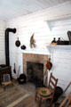Fireplace & stove in Cook's House at historic village of Mayborn Museum. Waco, TX.