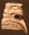 Walrus ivory carving of raven with crouching figure & masks by Haida culture of Queen Charlotte islands , BC at Dallas Museum of Art. Dallas, TX