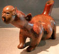 Ceramic dog with human mask from Jalisco, Mexico at Dallas Museum of Art. Dallas, TX.
