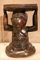 Wood stool supported by kneeling female figure by Luba culture of Democratic Republic of the Congo at Dallas Museum of Art. Dallas, TX.
