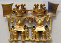Gold pendants of Twin Warriors in Conte-style from Panama at Kimbell Art Museum. Fort Worth, TX.