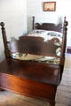 Cannonball bed in Mr. & Mrs. French's bedroom at John Jay French Museum. Beaumont, TX.