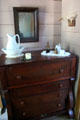 Bureau with bleeding horn on top in John Jay Junior's bedroom at John Jay French Museum. Beaumont, TX.