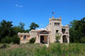 Ney's Formosa house sits in field of native Texas wildflowers at Ney Museum. Austin, TX.