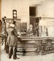 Photo of William Sydney Porter at his bank teller job at O. Henry Museum. Austin, TX.
