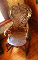 Wicker rocking chair original to Porter family at O. Henry Museum. Austin, TX.