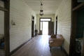 Dog trot-style hallway in Bell House at Pioneer Farms. Austin, TX.