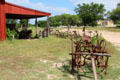 Farm machinery along country road at Pioneer Farms. Austin, TX.