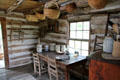 Interior of Kruger log cabin at Pioneer Farms. Austin, TX.