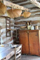 Baskets & cabinet in Kruger log cabin at Pioneer Farms. Austin, TX.