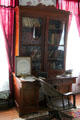Desk with bookcase in Muenzler House at Pioneer Village. Gonzales, TX.