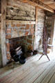 Rare central fireplace in Knowles Townsend dogtrot house at Pioneer Village. Gonzales, TX.
