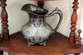Decorative silver pitcher in Jahn House at Conservation Plaza. New Braunfels, TX.