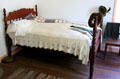 Bed with crotchet coverlet in Baetge House at Conservation Plaza. New Braunfels, TX.
