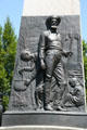 Mormon pioneers relief on Brigham Young monument. Salt Lake City, UT.