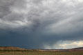 Landscape with rain in distance north of Monticello along Highway US191 south of Moab. UT.