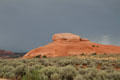 Bare sandstone mound along Highway US191 south of Moab. UT.