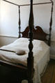 Bedroom with four poster bed in Moses Myers House museum. Norfolk, VA.