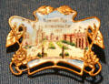 Jamestown Exposition souvenir pin with view from pier at Hampton Roads Naval Museum. Norfolk, VA.